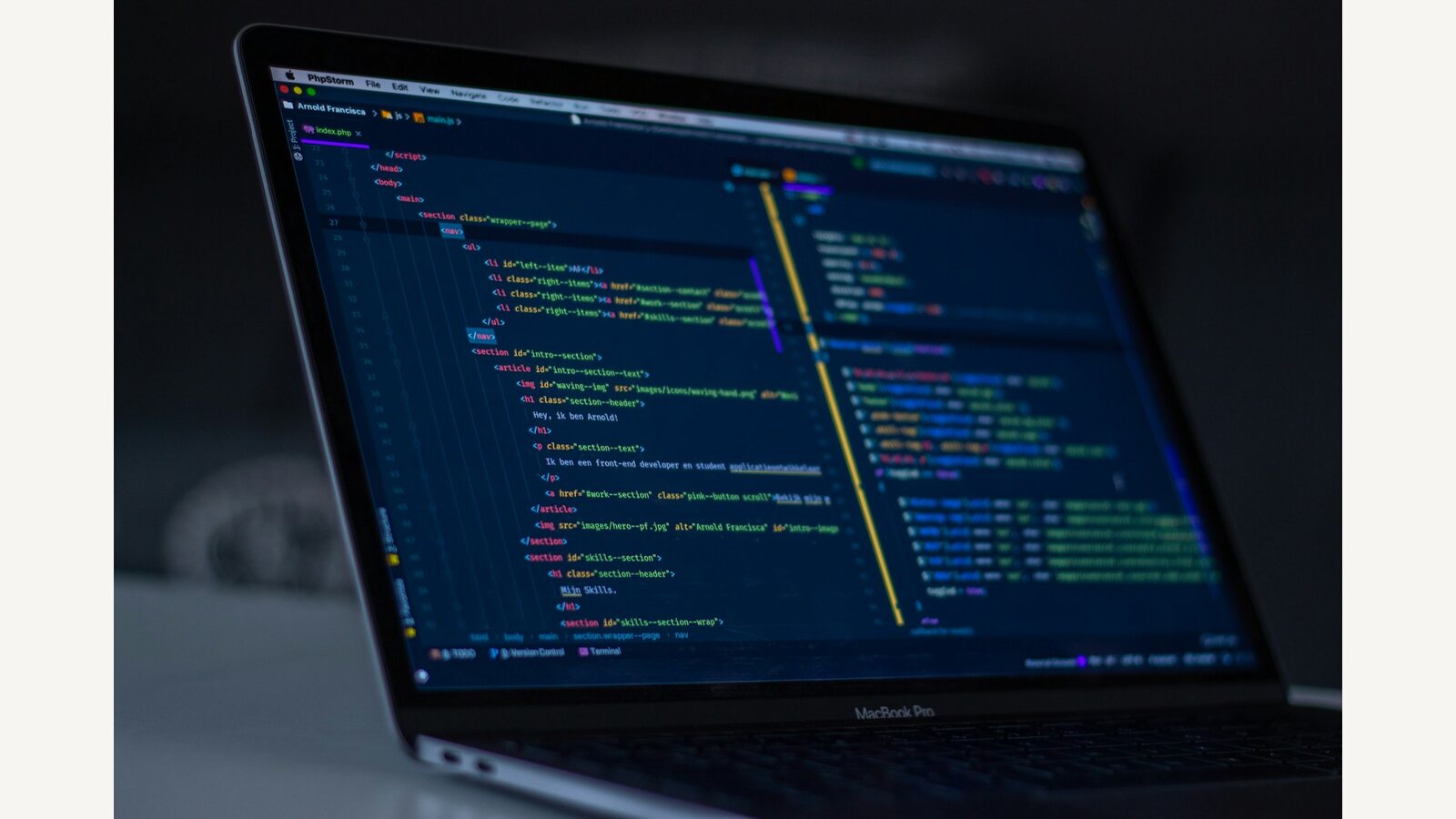Source code displayed on a laptop